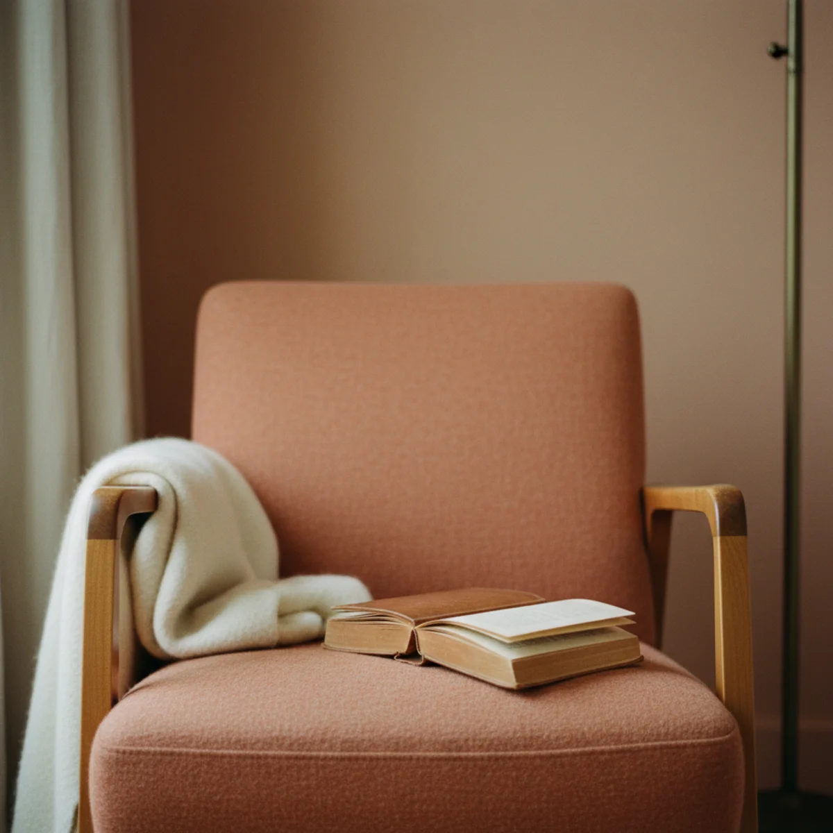Bedroom cozy ideas — small reading corner with worn leather armchair, oak side table, brass floor lamp, and small book stack in a warm bedroom — Home Decor Aura