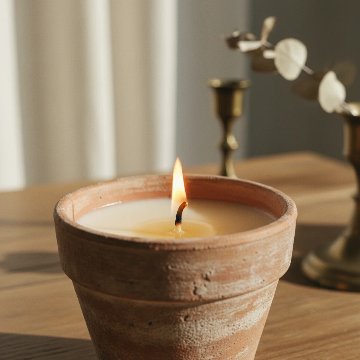 Best candles for cozy home — close-up of cotton wick burning cleanly with even flame in soy candle showing the reliable standard wick choice — Home Decor Aura