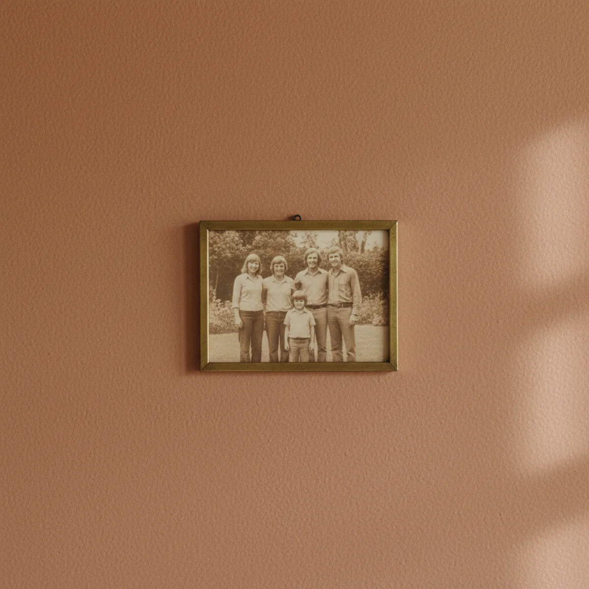 Gallery wall ideas — gallery wall mixing bought art with personal pieces including a child's drawing in a nice frame and vintage family photograph — Home Decor Aura