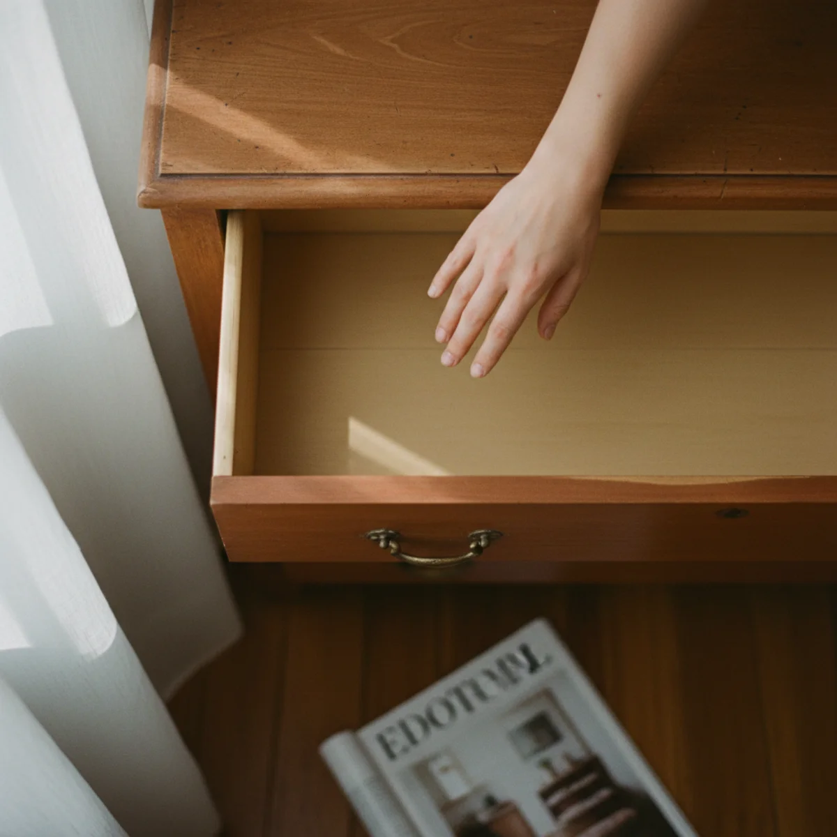 Painted dresser makeover — open drawer of a sage-painted dresser showing warm cream interior paint as the jewel-box contrast interior — Home Decor Aura
